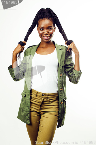 Image of young pretty african-american girl posing cheerful emotional on white background isolated, lifestyle people concept