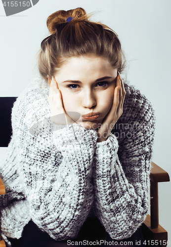 Image of beauty young real woman in sweater at winter warmed up, cheerful