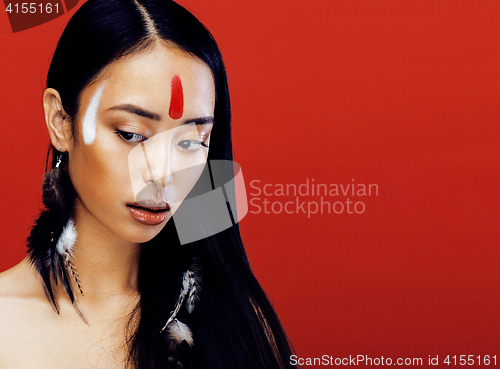 Image of beauty young asian girl with make up like Pocahontas, red indian