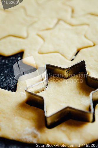 Image of Star form placed in cookie dough