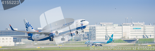 Image of Airplane Boeing 737 of SunExpress taking off from Munich interna