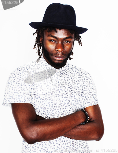 Image of young handsome afro american boy in stylish hipster hat gesturin