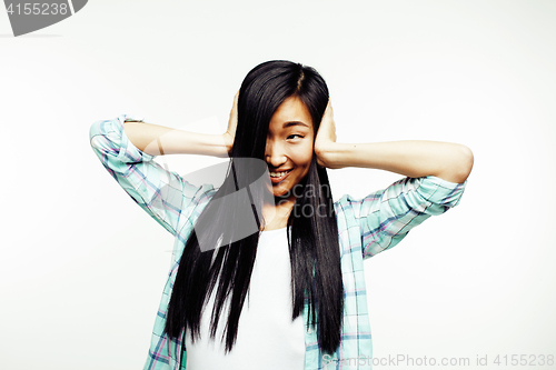 Image of young pretty asian woman posing cheerful emotional isolated on white background, lifestyle people concept