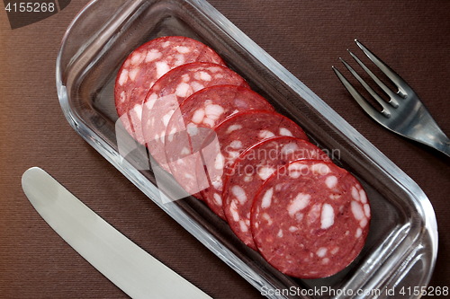 Image of slices salami on a plate