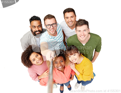 Image of international group of happy people taking selfie