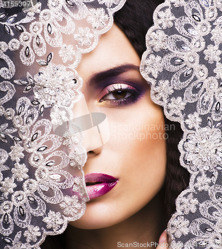 Image of beauty young woman throw white lace close up, bride under veil, 