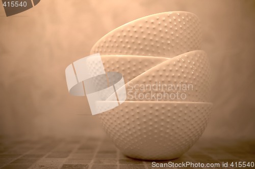 Image of still life with ceramic tureens in sepia color