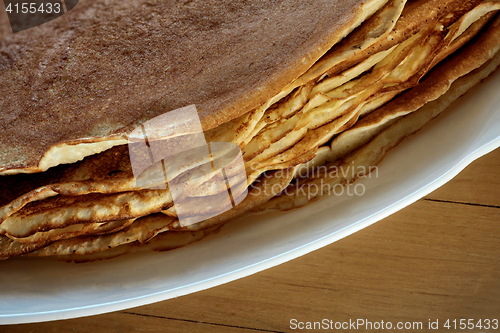 Image of  stack of pancakes roasting it