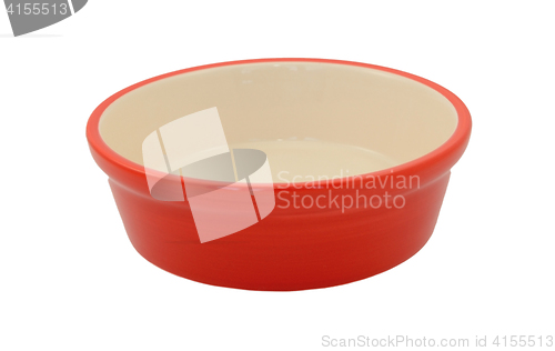 Image of Red empty pet food bowl