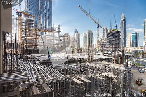 Image of Modern building constraction site works.