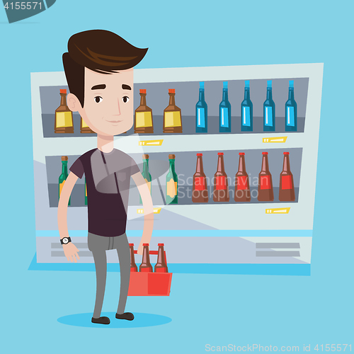 Image of Man with pack of beer at supermarket.