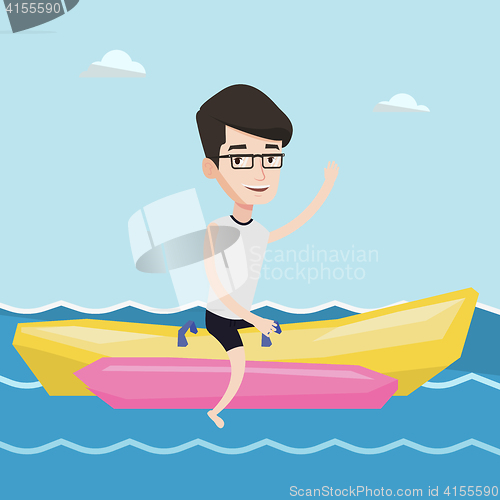 Image of Tourists riding a banana boat vector illustration.