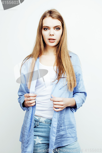 Image of young pretty stylish hipster teen blond girl posing emotional isolated on white background happy smiling cool smile, lifestyle people concept