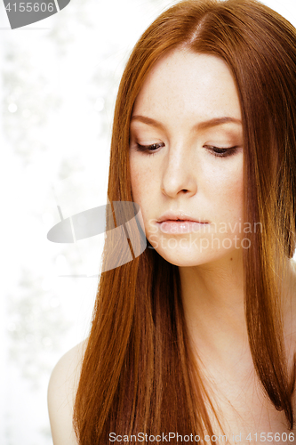 Image of beauty young redhead woman with red flying hair, funny ginger fr