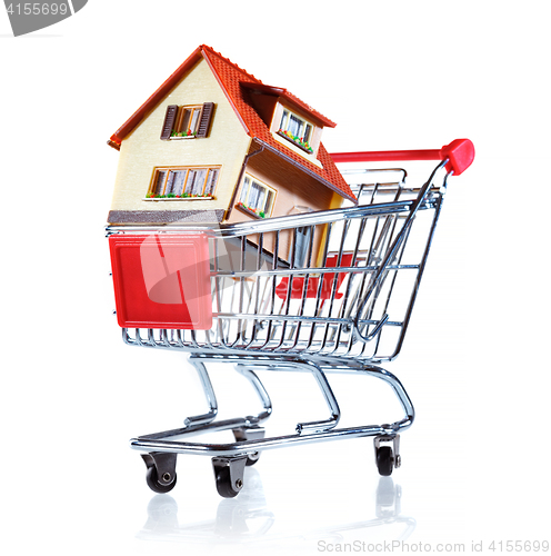 Image of Shopping cart and house