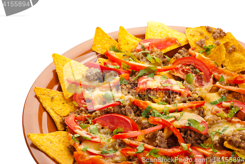 Image of spicy nachos with pork, tomato and pepper