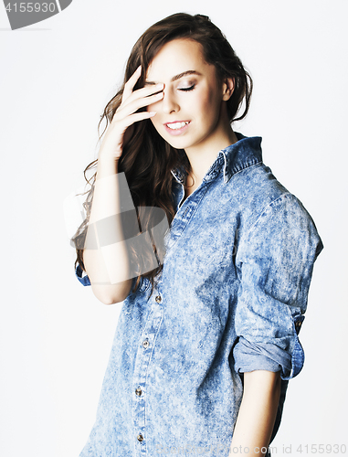 Image of young cheerful brunette teenage girl on white background