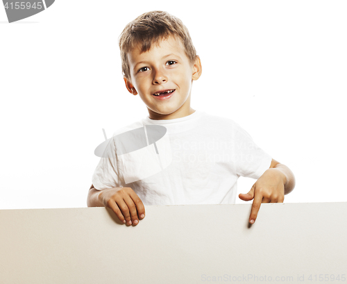 Image of little cute boy holding empty shit to copyspace isolated close u