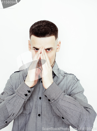 Image of young handsome well-groomed guy posing emotional on white background, lifestyle people concept