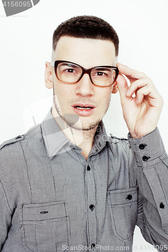 Image of young handsome well-groomed guy posing emotional on white background, lifestyle people concept