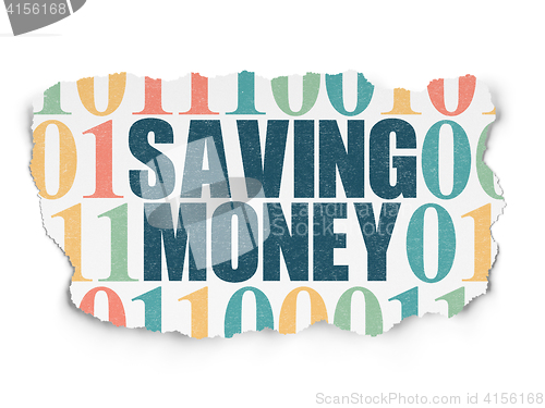 Image of Finance concept: Saving Money on Torn Paper background