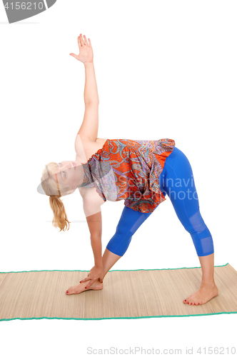 Image of Yoga stretching from woman trainer.