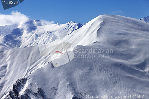 Image of Speed flying in snow winter mountains