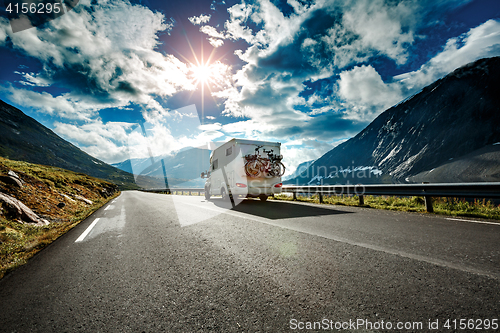 Image of Caravan car travels on the highway.