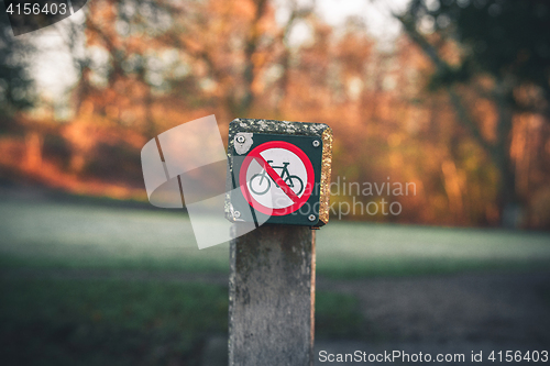 Image of Bike restriction sign in a park