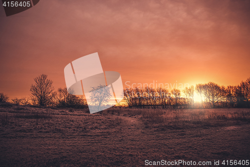 Image of Beautiful sunrise in a countryside landscape