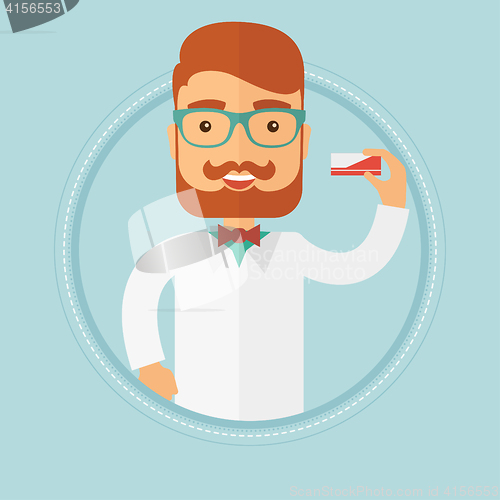 Image of Pharmacist showing some medicine.