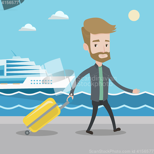 Image of Passenger with suitcase going to shipboard.