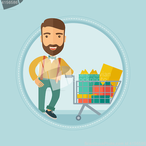 Image of Customer with shopping trolley full of gift boxes.