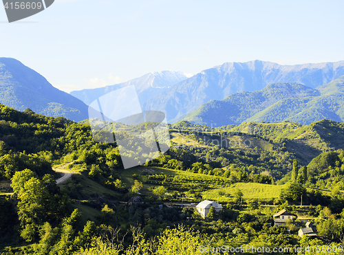 Image of beautiful view on village in mountains, postcard from south