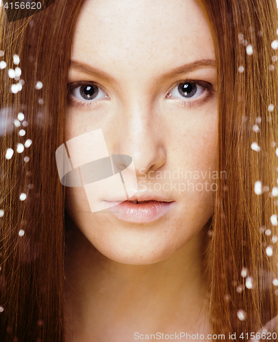 Image of red hair woman with drops on her face
