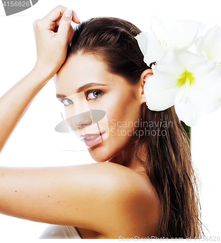 Image of young pretty woman with  Amarilis flower close up isolated on wh