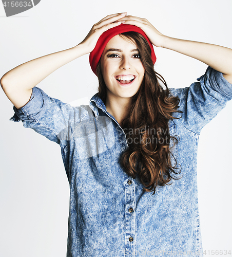Image of young cheerful brunette teenage girl on white background