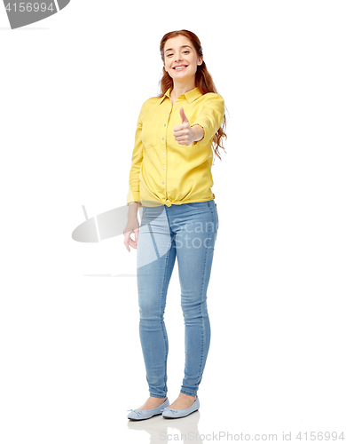 Image of happy woman showing thumbs up