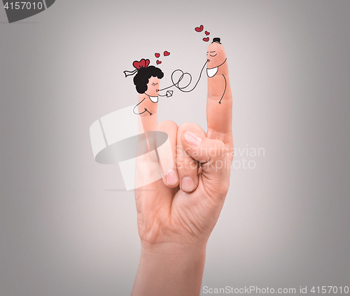 Image of happy couple in love with painted faces