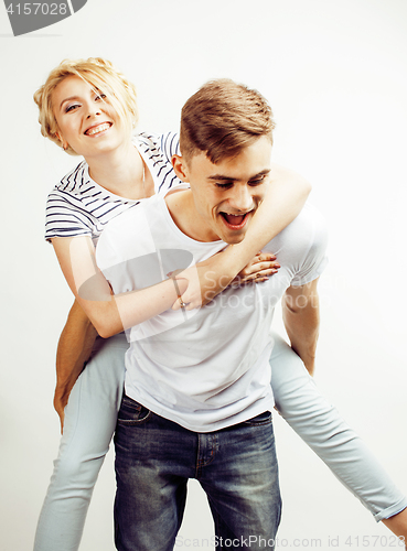 Image of young pretty teenage couple, hipster guy with his girlfriend happy smiling and hugging isolated on white background, lifestyle people concept