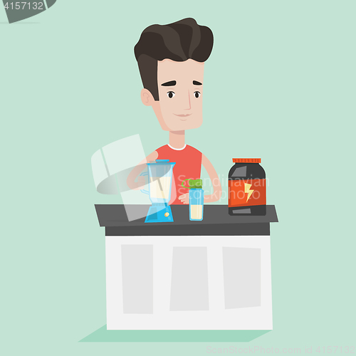 Image of Young man making protein cocktail.