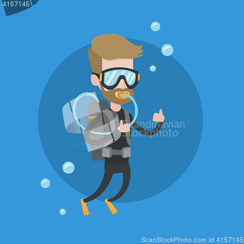 Image of Man diving with scuba and showing ok sign.