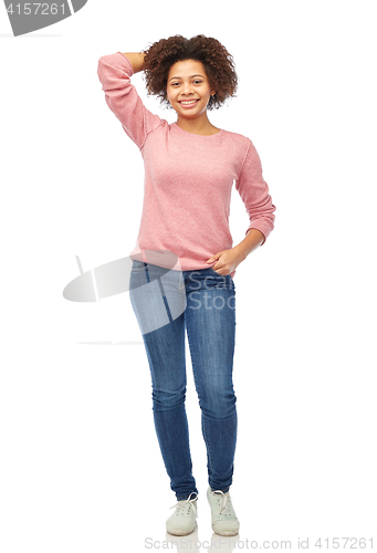 Image of happy african american young woman over white