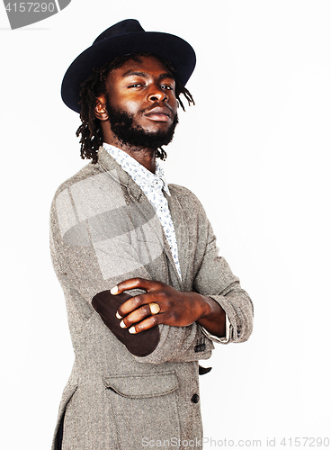 Image of young handsome afro american boy in stylish hipster hat gesturin