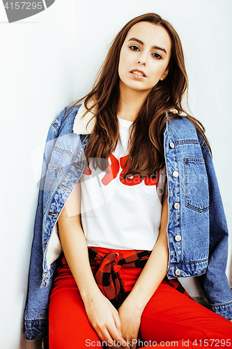 Image of young pretty stylish hipster girl posing emotional isolated on white background happy smiling cool smile, lifestyle people concept