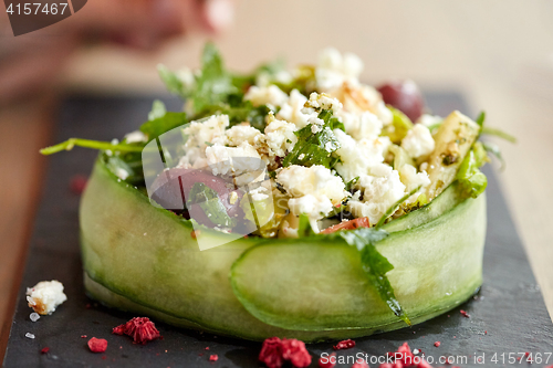 Image of cottage cheese salad with vegetables at restaurant