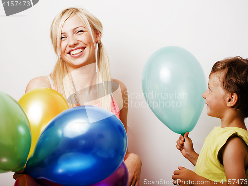 Image of pretty real family with color balloons on white background, blon