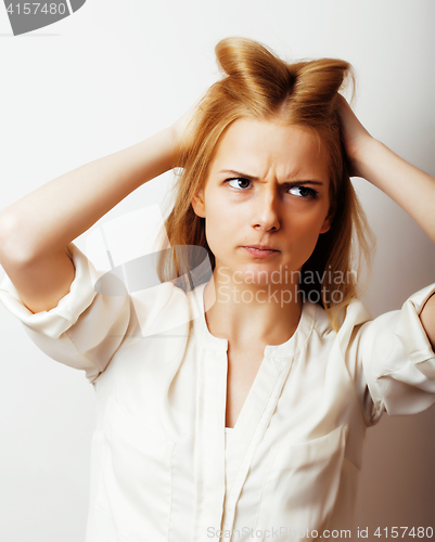 Image of young blond woman on white backgroung gesture thumbs up, isolate