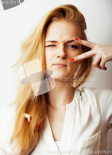 Image of young blond woman on white backgroung gesture thumbs up, isolate