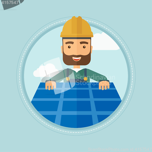 Image of Constructor installing solar panel.